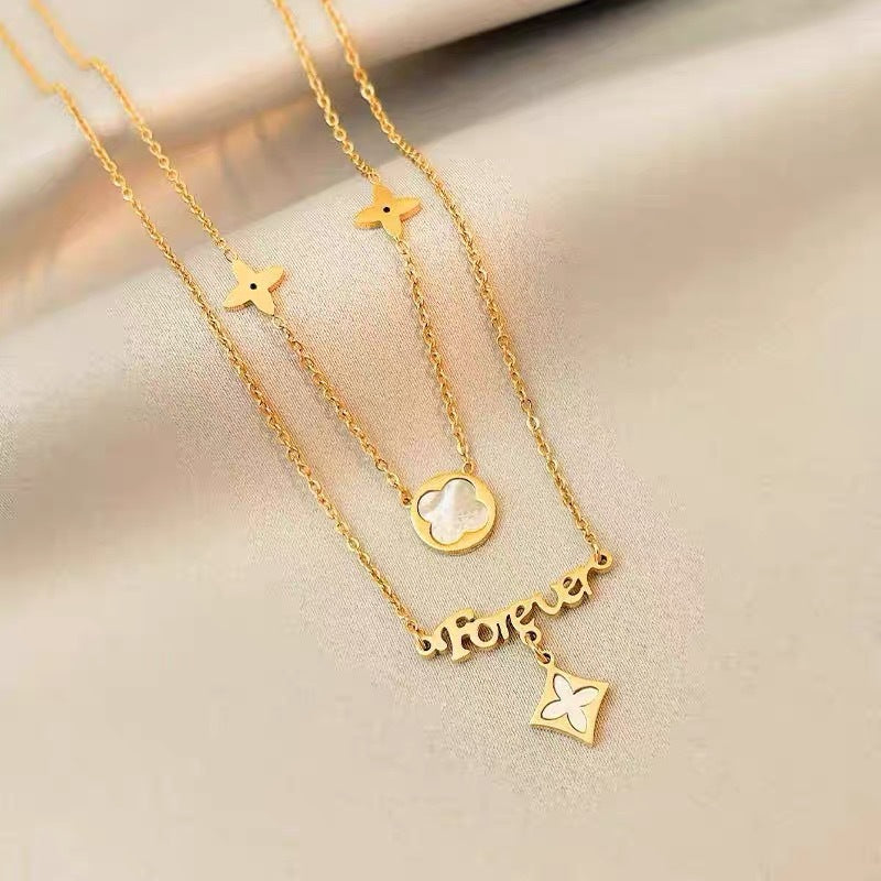 Original Design Clover-Shaped Pendant Necklace in Titanium Steel with Gold Plating on Clavicle Chain