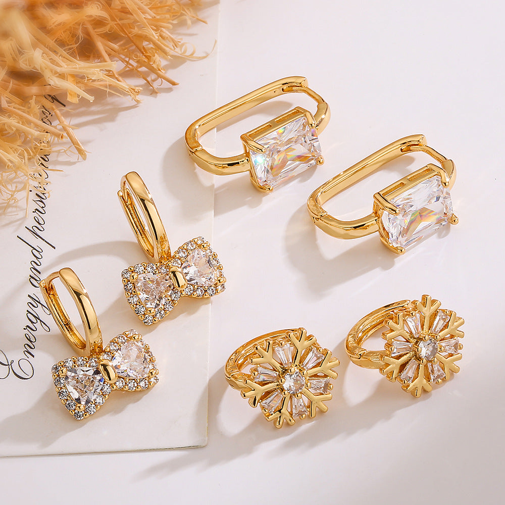 Minimalist Elegant Gold Plated Brass Geometric Bow Snowflake Earrings with Cubic Zirconia for Women