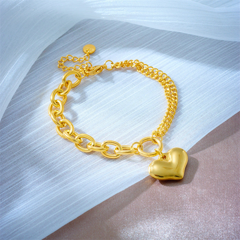Braccialetto placcato in acciaio al titanio a forma di cuore, vintage e minimalista, con design geometrico, per uomo e donna