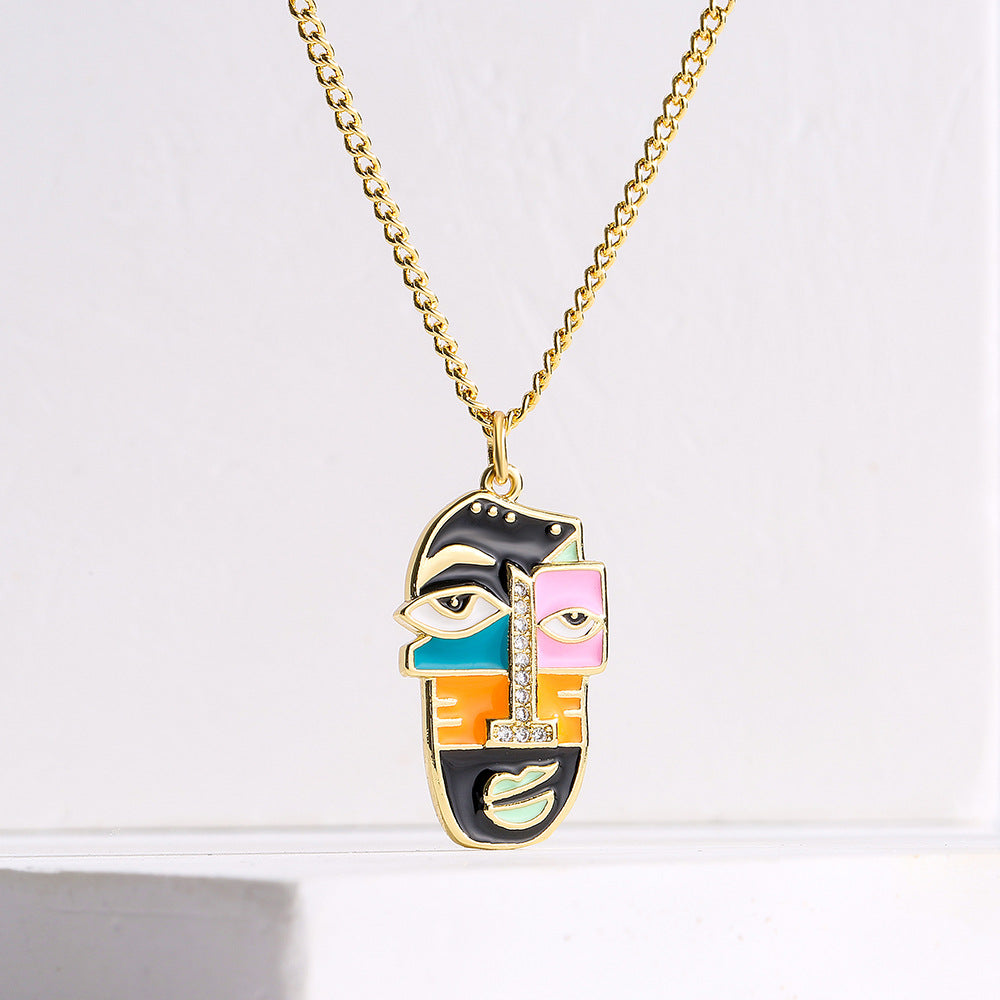 Abstract Face Pendant Necklace for Women in Copper with 18K Gold Plating Rhinestone Inlay and Enamel Finish
