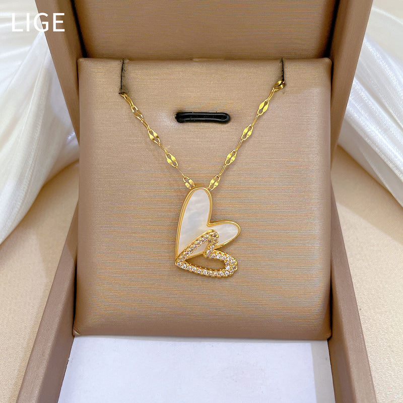 Elegant Hollow-Out Heart Pendant Necklace for Women Stainless Steel Double Layer Delicate Collarbone Chain with Rhinestone Accents