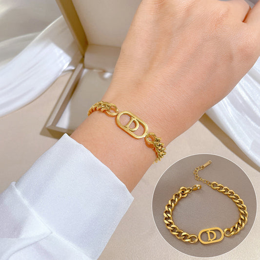 Minimalist Letter D Titanium Steel Bracelet for Women with Gold Plating and Wavy Texture