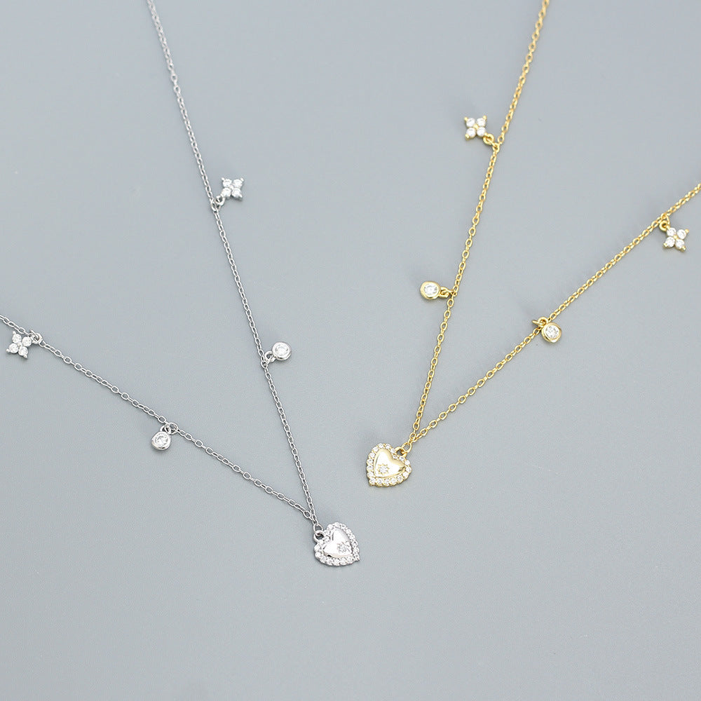 Sweet and Edgy Heart-Shaped S925 Sterling Silver Rhinestone-Inlaid French Clavicle Necklace with Cross Chain for Women