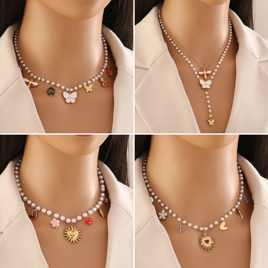 Fashionable OL Style Hollow Heart and Floral Pendant Necklace in Titanium Steel with Electroplated Finish for Women