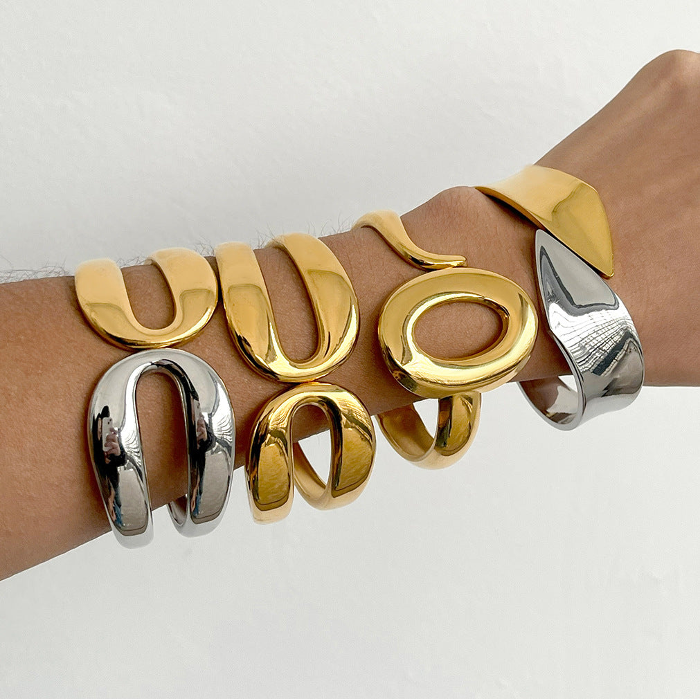 Pulsera geométrica de titanio y acero con baño de oro de 18 quilates Fashion-Commuter para mujer