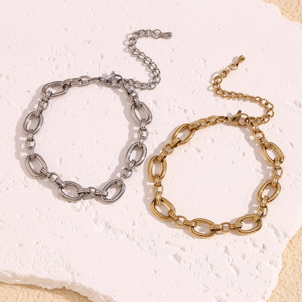 Pulsera de acero inoxidable geométrica minimalista chapada en oro de 14 quilates con forma de O grande para mujer