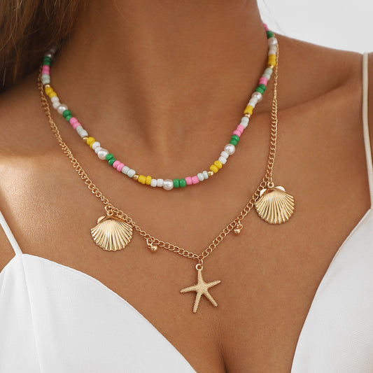 Collar con colgante de conchas marinas naturales y estrellas de mar con cuentas geométricas y cadena de aleación para mujer