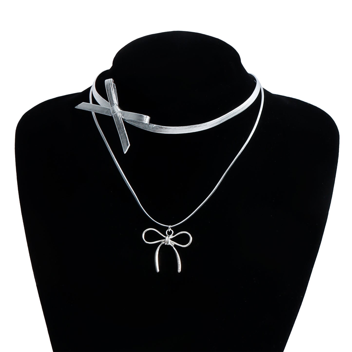 Collana pendente a forma di fiocco minimalista da donna in lega con finitura placcata e delicata catena a clavicola