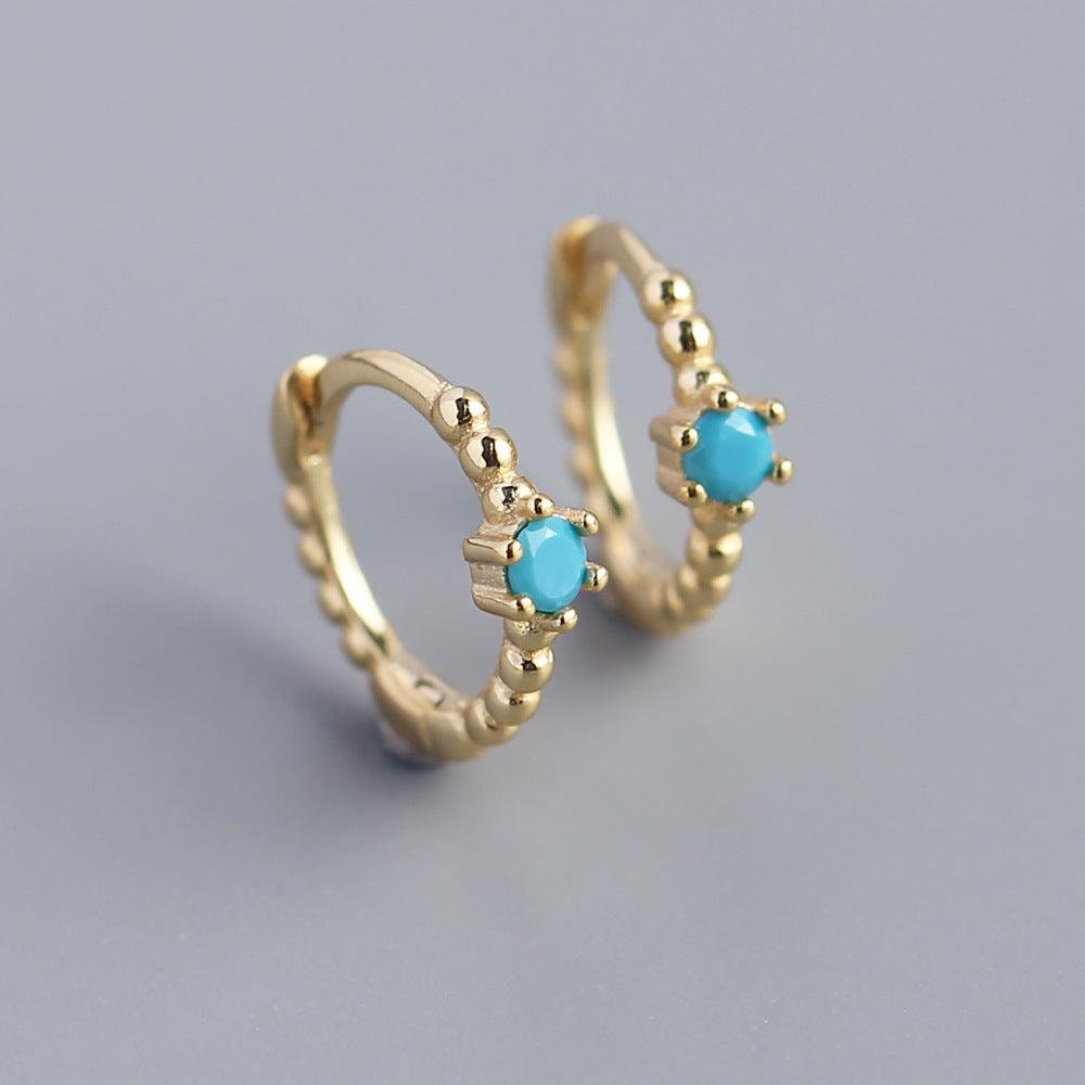 Orecchini a perno tondi con intarsi di diamanti in argento sterling 925