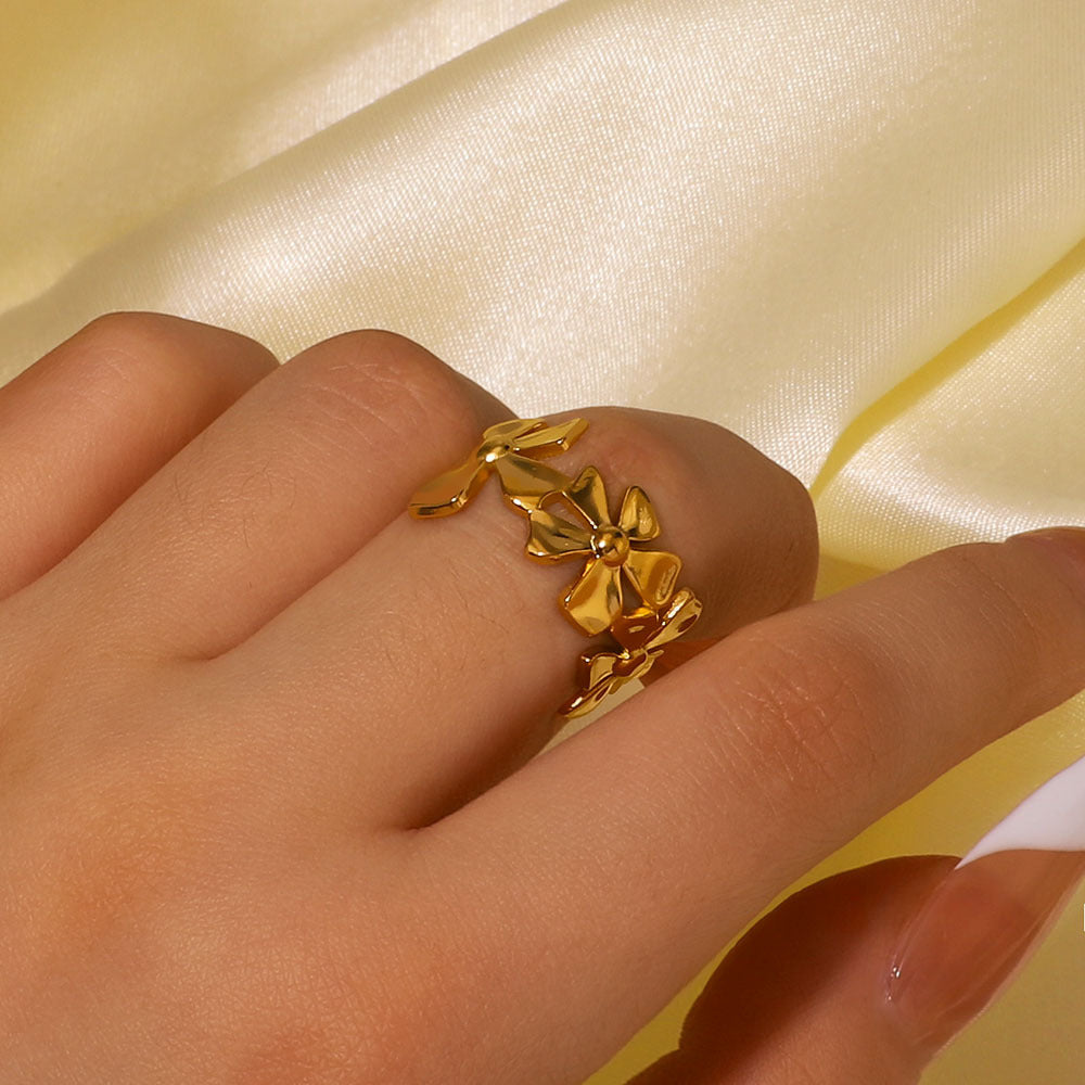 Anello regolabile in acciaio inossidabile lucido con motivo floreale minimalista e design ovale geometrico, per donna e uomo