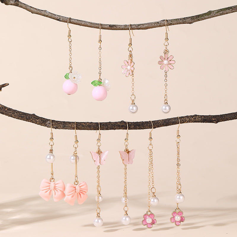 Pendientes largos de borla con colgante minimalista de estrella de mar y concha marina para niñas hechos de resina plástica