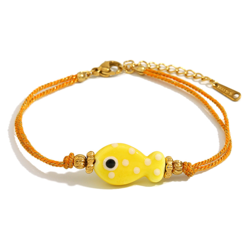 Bracciale da donna in corda intrecciata color oro, placcato in oro 18 carati, stile OL alla moda, a forma di pesce