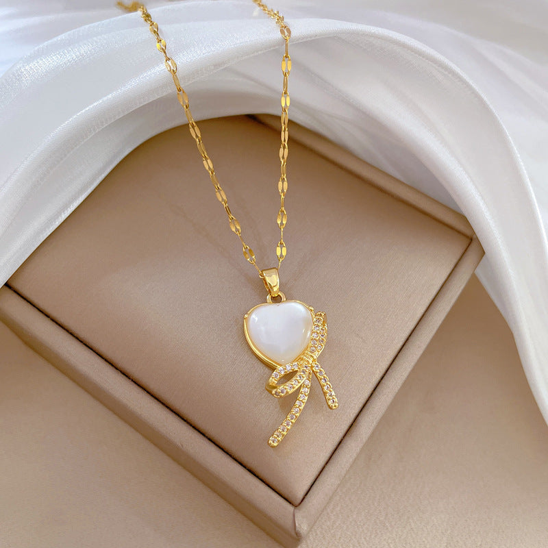 Minimalist Bowknot Pendant Necklace for Women Stainless Steel Chain with Rhinestone Inlay and Moon Motif