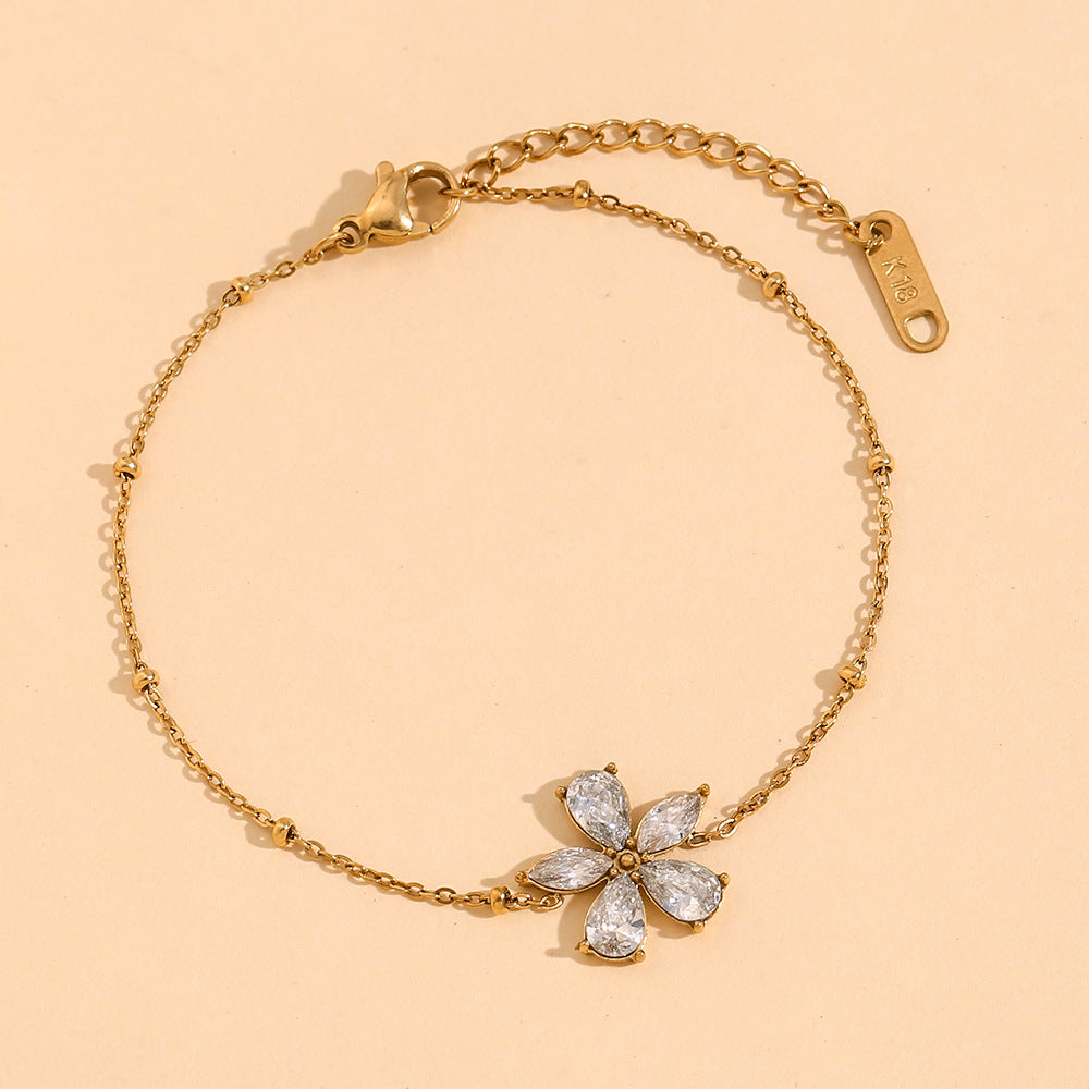 Bracciale da donna placcato oro 18 carati in acciaio inossidabile con fiore di zircone, motivo floreale alla moda