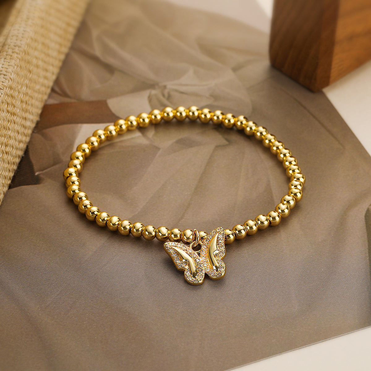 Elegant French-Style Copper Bracelet with Gold Plating, Zircon Inlay, Butterfly and Geometric Design, Women's Fashion Accessory