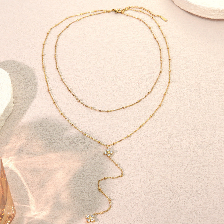 Collana a Nappa da Donna placcata in Acciaio Inox di Lusso con Zirconi Cubici e Motivo Floreale