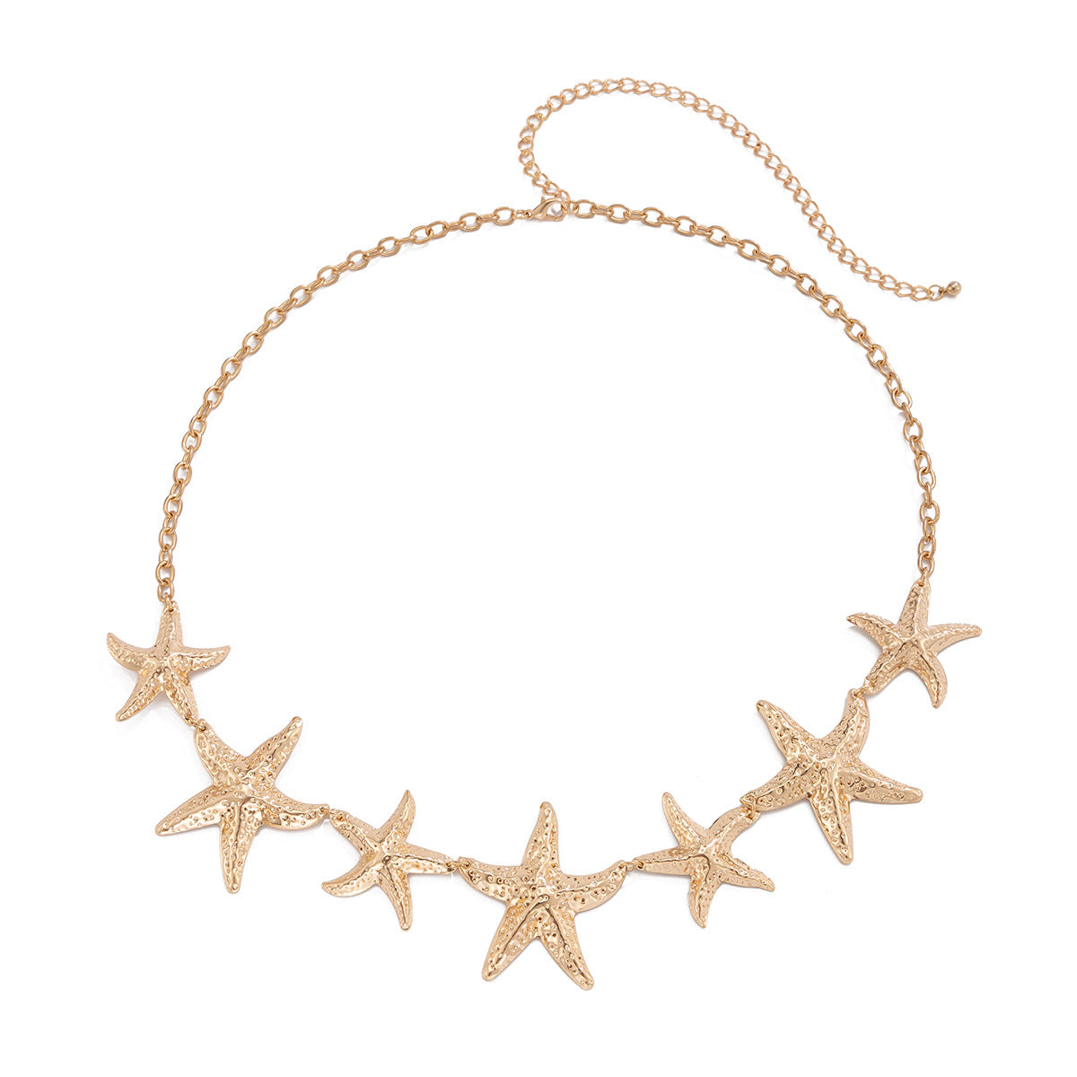 Cadena corporal de inspiración bohemia marina para mujer con motivos de estrellas de mar y flores, hecha de metal con acabado pulido y cierre de langosta