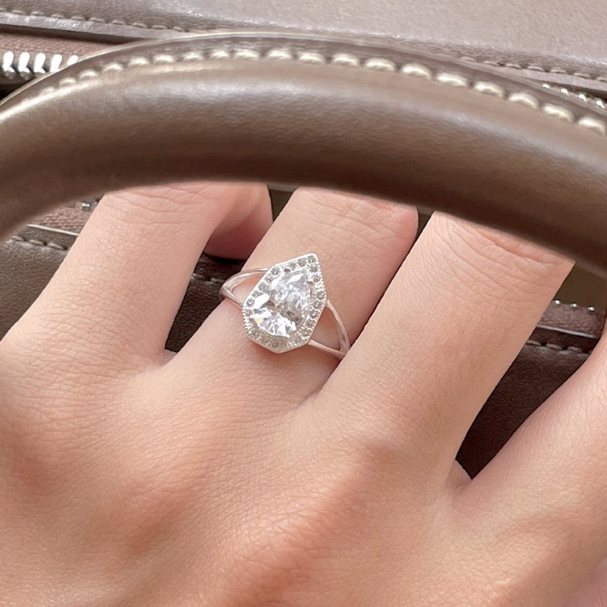 Minimalist Teardrop-Shaped S925 Sterling Silver Ring with Rhinestone Inlay and Bowknot Detail for Women
