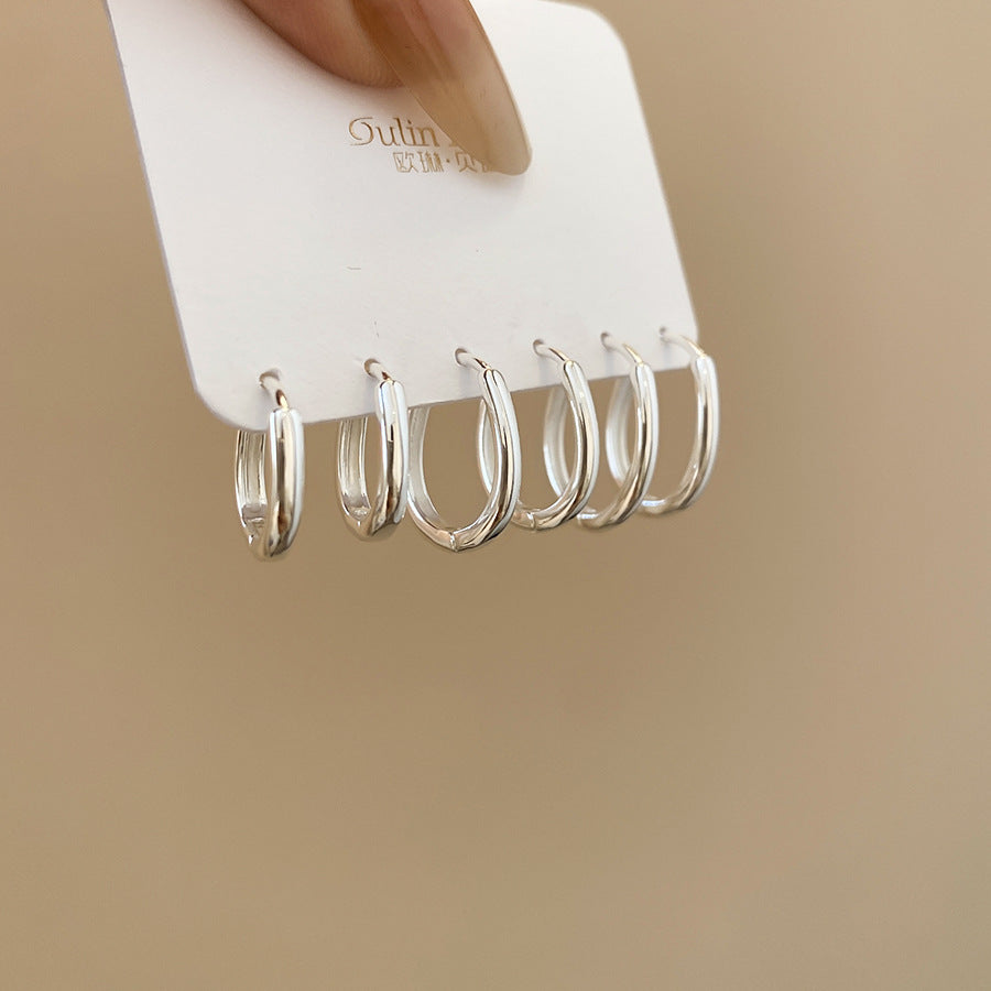 Orecchini a perno da donna a forma di stella geometrica in metallo con finitura lucida e superficie galvanizzata, gioielli alla moda minimalisti per tutti i giorni