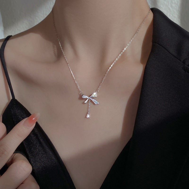 Minimalist Bow-Shaped Titanium Steel Pendant Necklace for Women with Plated Finish and Delicate Layered Look
