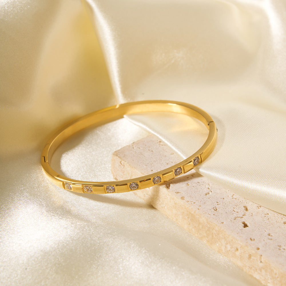 Fashionable 18K Gold Plated Stainless Steel Bracelet with White Zircon Inlay Geometric Ring Design for Women