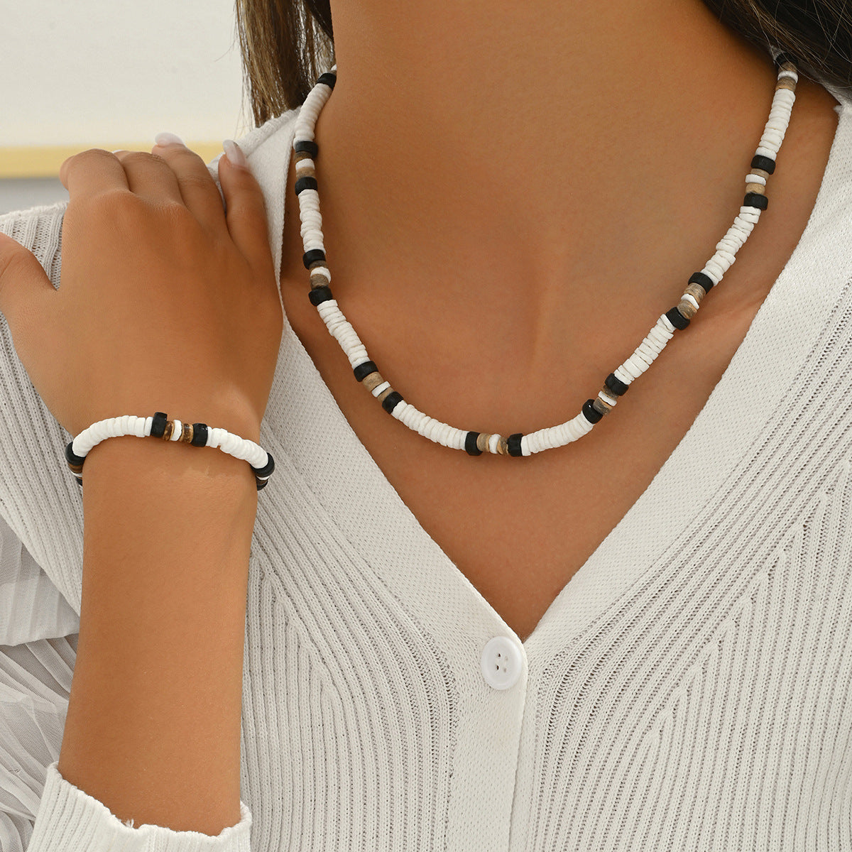 Set collana e bracciale in maglia a conchiglia geometrica da donna con dettagli circolari e a pois