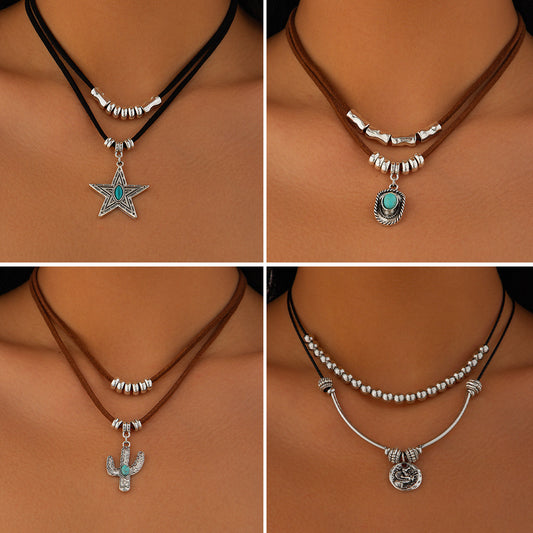 Collana da donna stile punk con ciondolo in lega a forma di cuore irregolare e finitura placcata