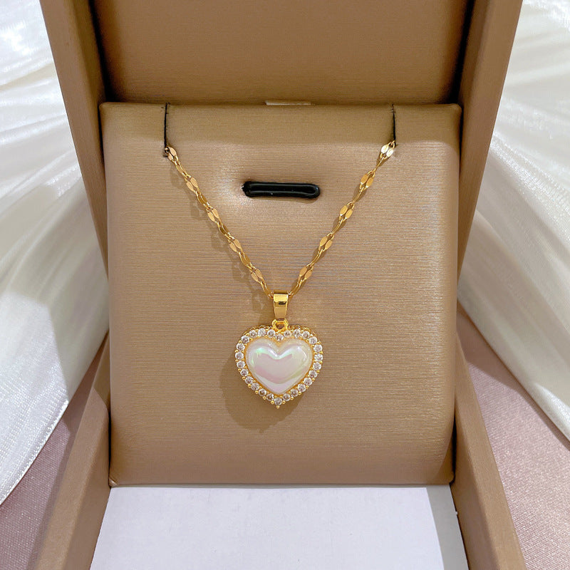 Collana Pendente Cuore Sirena Minimalista in Acciaio al Titanio con Accenti di Zirconi Micro-Incastonati
