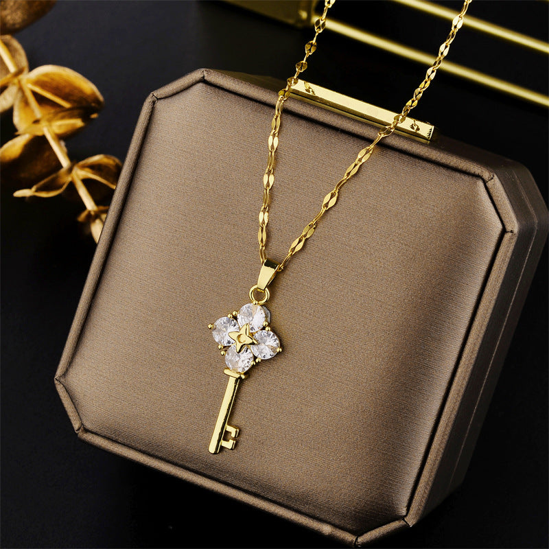 Geometric Key Pendant Necklace for Women in Titanium Steel with Gold Plating and Fringe Detail