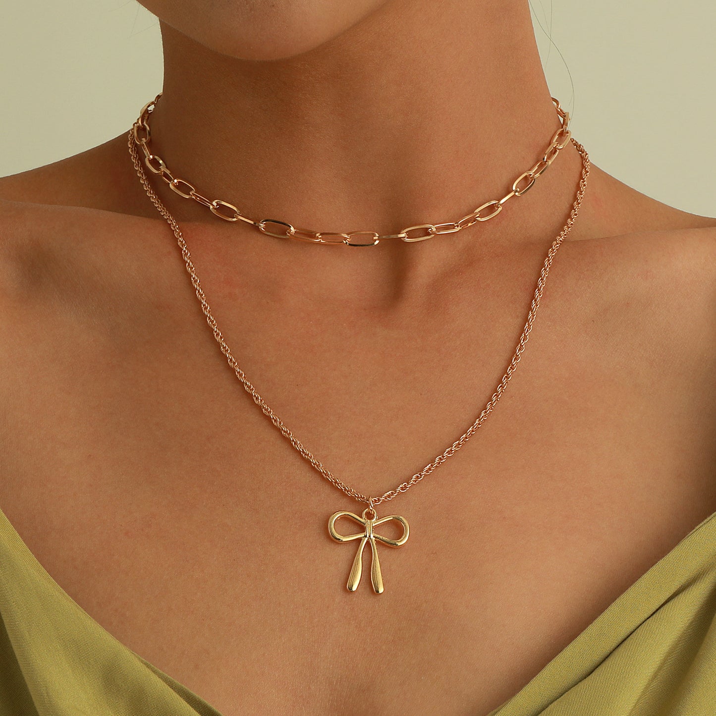 Punk Style Bow-Shaped Alloy Pendant Necklace with Plated Finish and Double-Layer Cross Chain