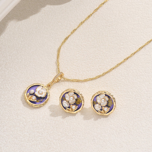 Set di orecchini e collana in rame con intarsio di perle e design floreale per donna, con finitura lucida