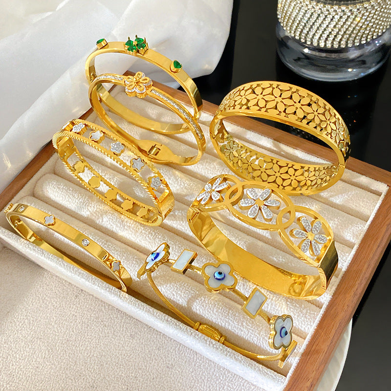 Luxury Floral Hollow Snowflake Daisy Titanium Steel Plated Bangle Bracelet