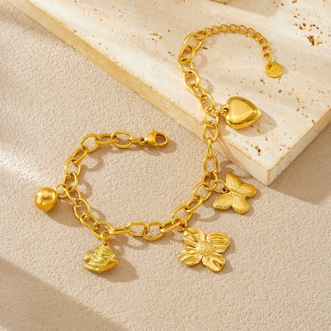 Gold Plated Stainless Steel Cable Chain Bracelet with Butterfly and Floral Charms