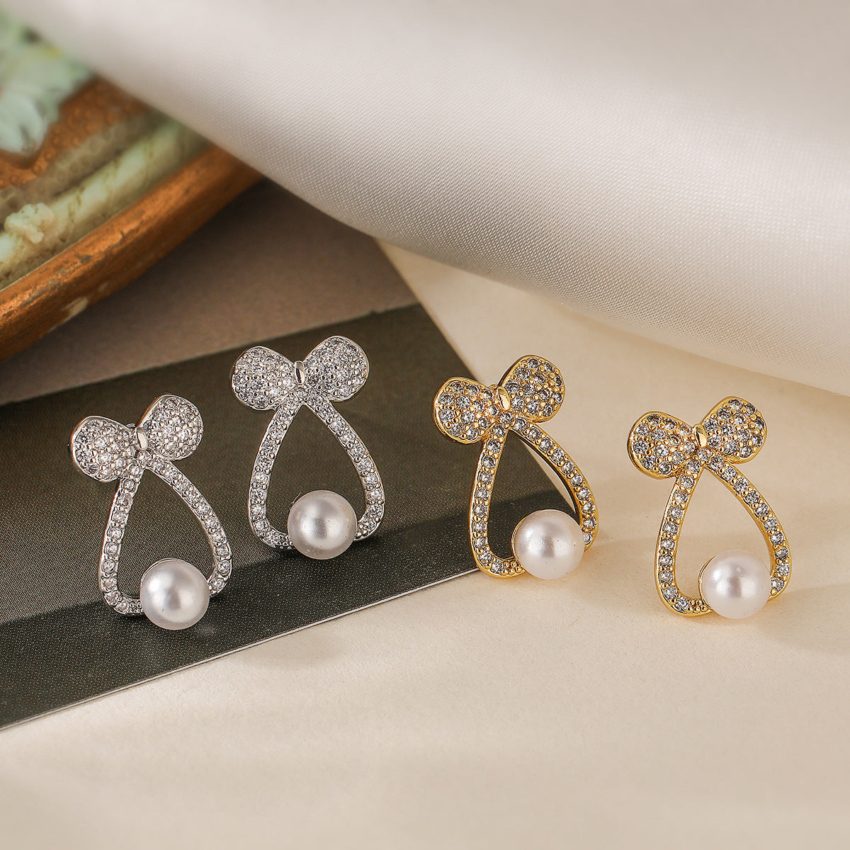 Geometric Bowknot Butterfly Earrings for Women with Copper Base Plated in Real Gold Micro-Paved Zirconia and Pearl Accents