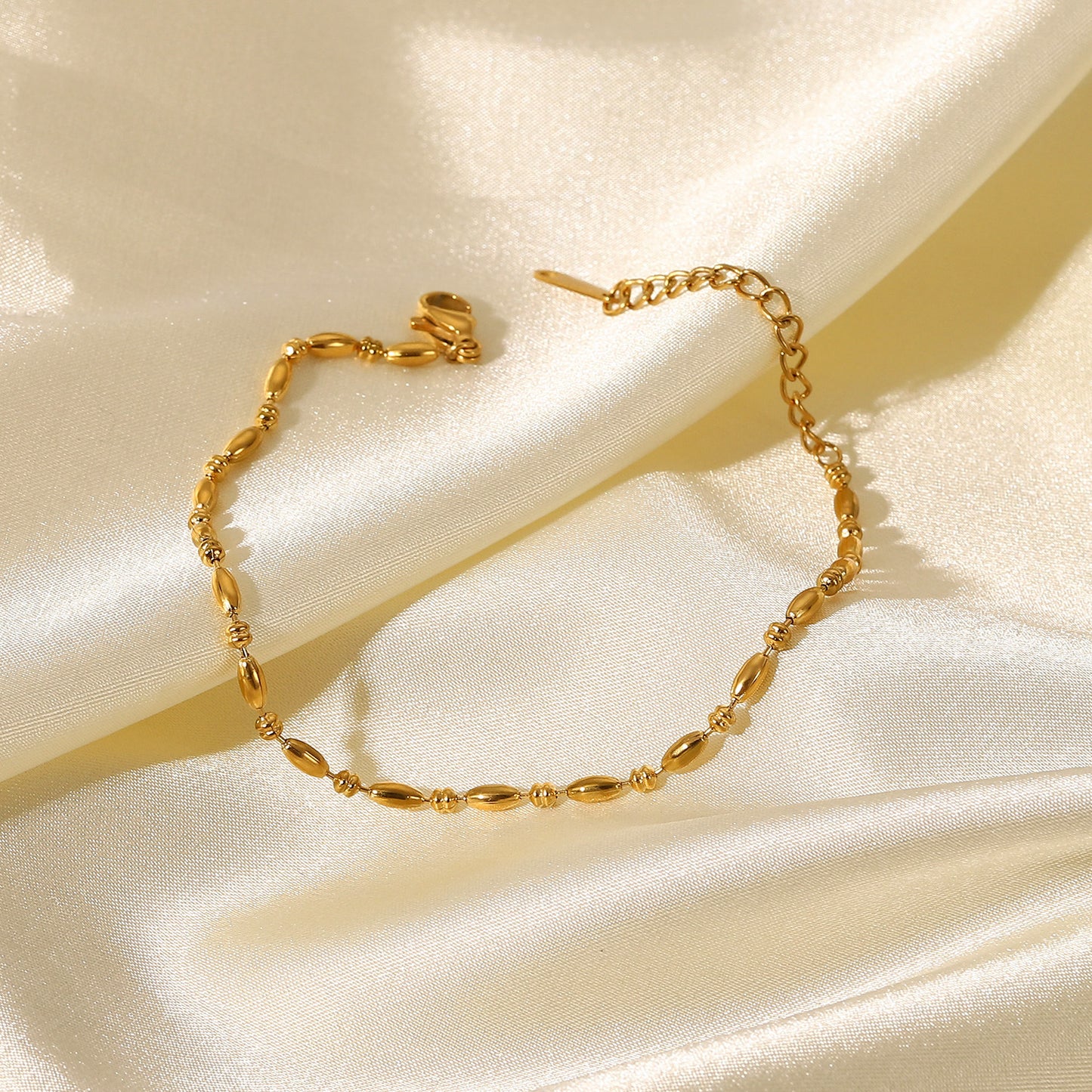 INS-Inspired Women's Geometric Stainless Steel Bracelet with 18K Gold Plated Oval Beads and Minimalist Chain Design