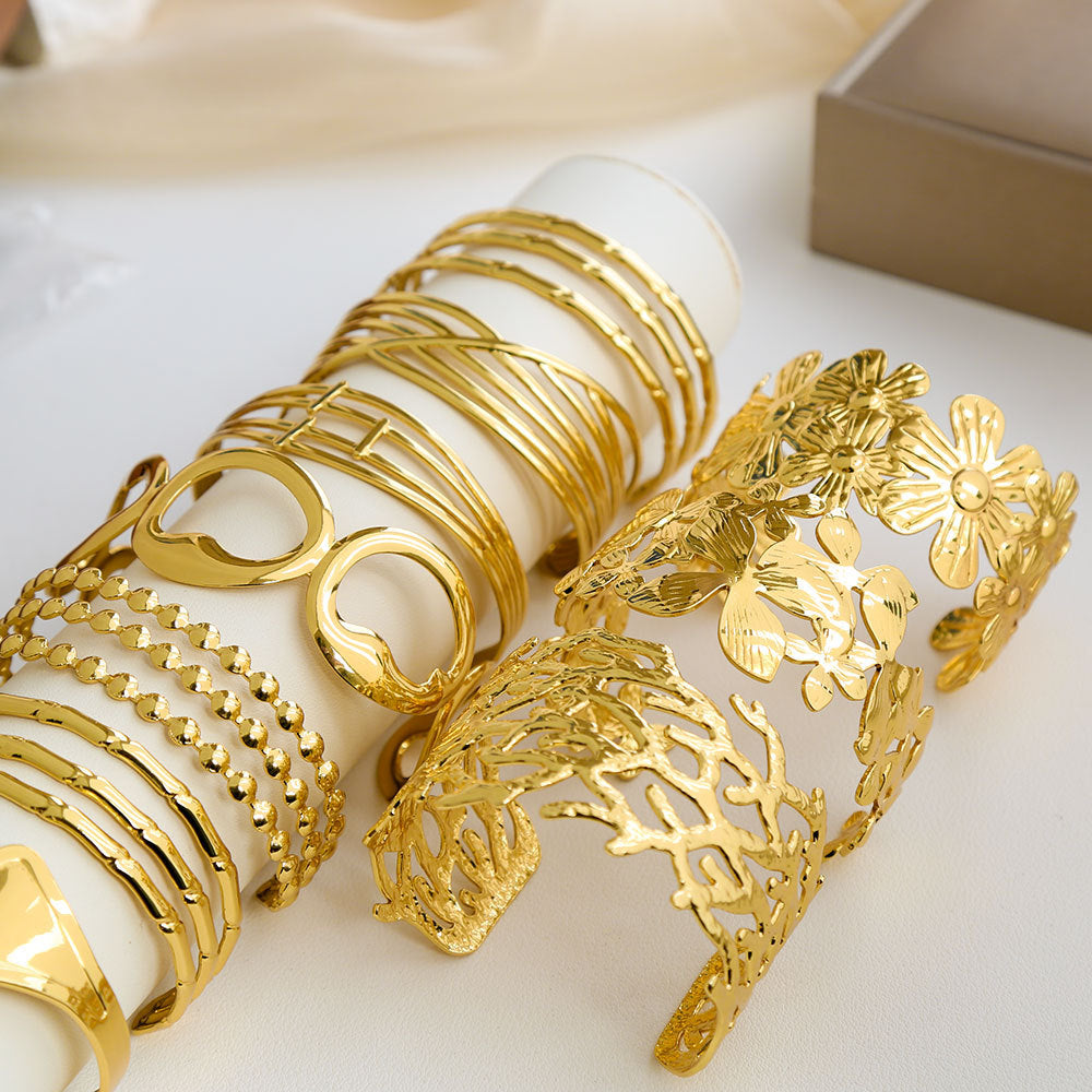 Bracciale Minimalista Ispirato alla Francia in Acciaio Inossidabile con Trafori a Motivi Floreali di Foglie e Girasoli