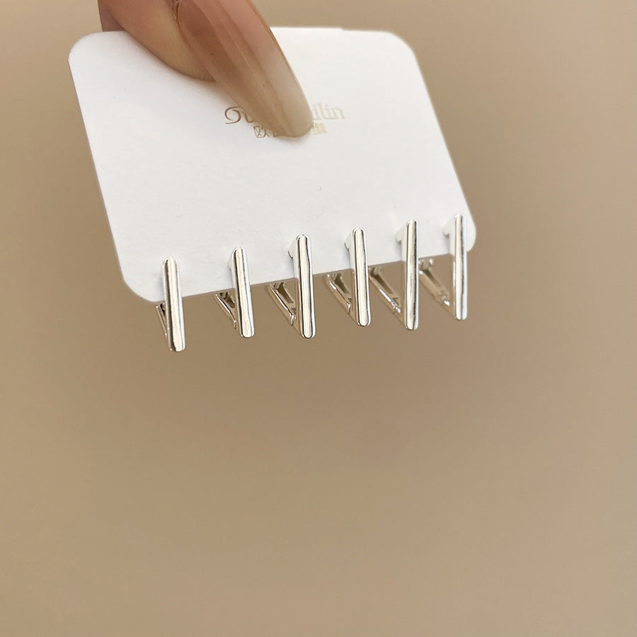 Orecchini a perno da donna a forma di stella geometrica in metallo con finitura lucida e superficie galvanizzata, gioielli alla moda minimalisti per tutti i giorni