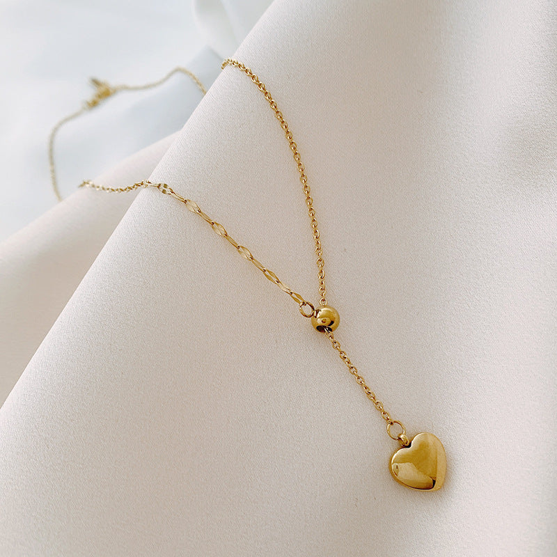 Minimalist Elegant Gold-Tone Titanium Steel Heart Pendant Necklace for Women Adjustable Clavicle Chain