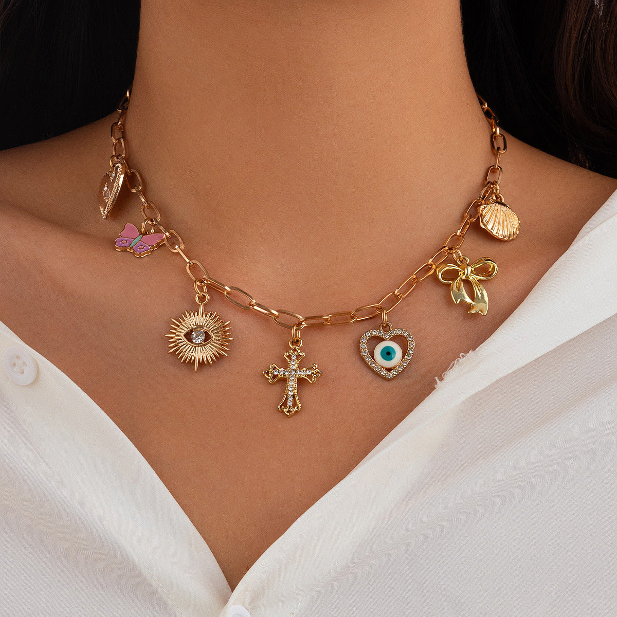 Collana pendente minimalista con stella e conchiglia, nappina e design a coda di sirena, in lega con finitura placcata