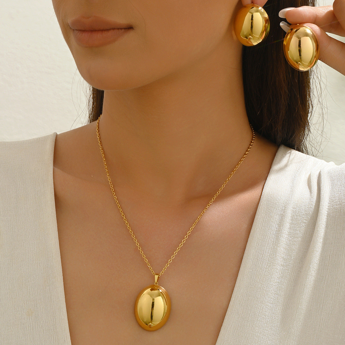 Set collana con ciondolo in metallo ovale e cerchio geometrico con orecchini da donna, lega con finitura galvanica