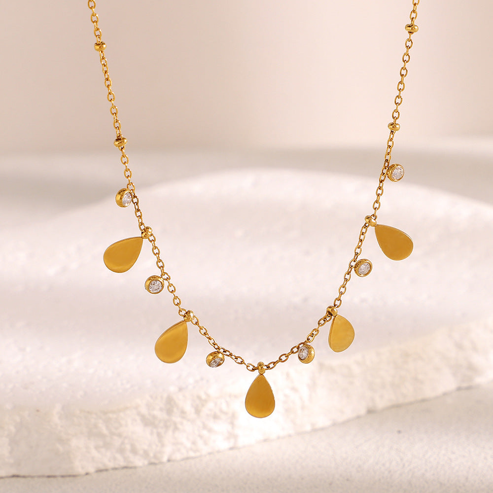 Collana pendente minimalista in acciaio inossidabile a forma di goccia con placcatura in oro 18K e intarsio di zirconi per donne