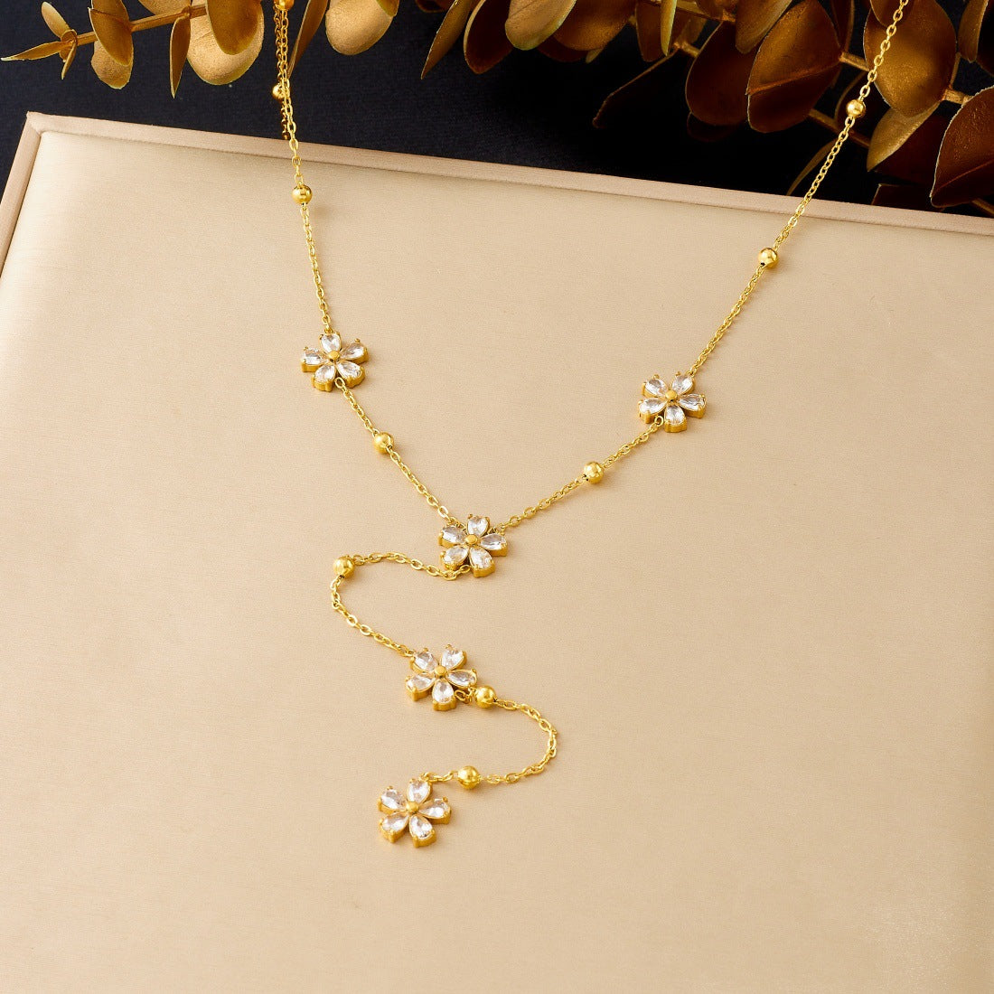 Elegant Gold Plated Stainless Steel Y-Chain Necklace with Rhinestone Floral and Star Charms