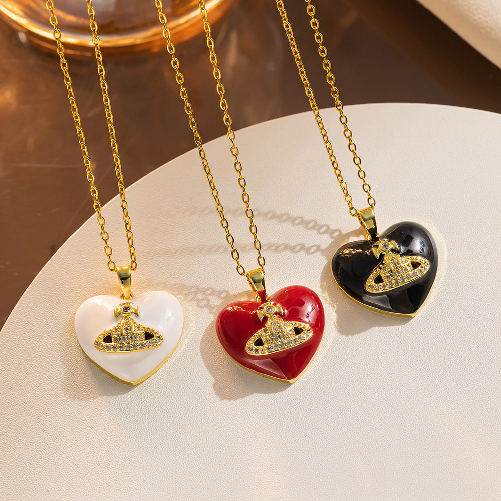 Collana con pendente a cuore minimalista da donna in acciaio al titanio con intarsio in strass e finitura placcata, elegante catena clavicola