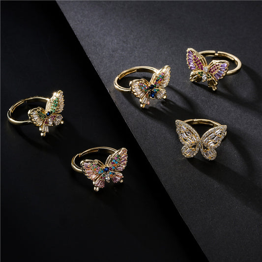 INS Style Geometric Butterfly Ring in Copper with Micro-Paved Cubic Zirconia and 18K Gold Plating