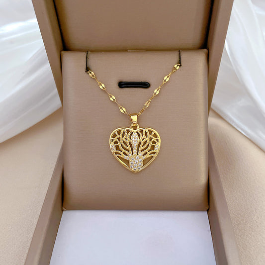 Collar minimalista con colgante de corazón hueco para mujer y hombre, cadena de serpiente de acero inoxidable con detalles de diamantes de imitación