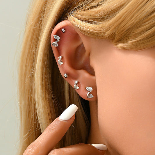 Orecchini a perno geometrici minimalisti in rame con intarsio in zircone per donna