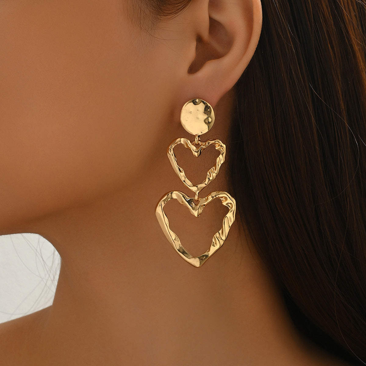 Pendientes de tuerca minimalistas en forma de corazón de aleación de zinc con acabado chapado para mujer