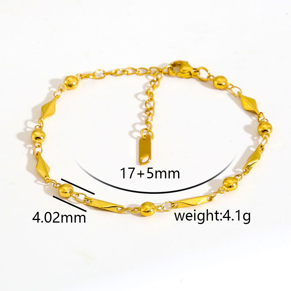 Cavigliera minimalista da donna in acciaio inossidabile placcato oro con piccole perline e ciondolo rotante