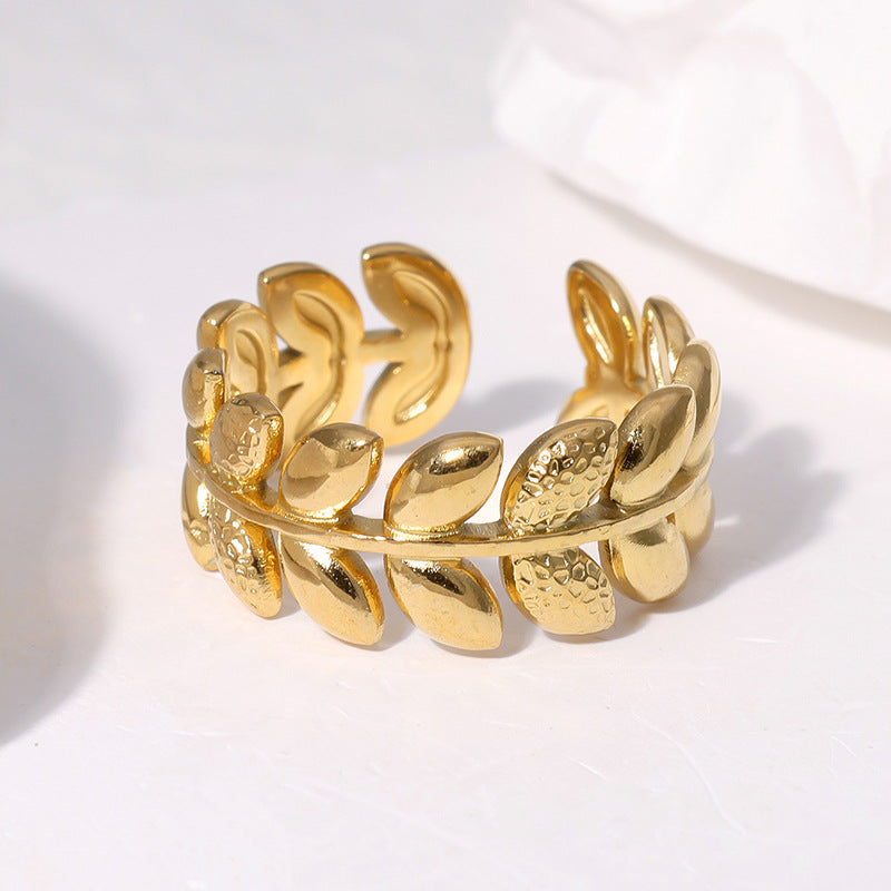 Anello da donna regolabile a fascia aperta in acciaio inossidabile placcato oro 18K a forma di foglia, stile minimalista