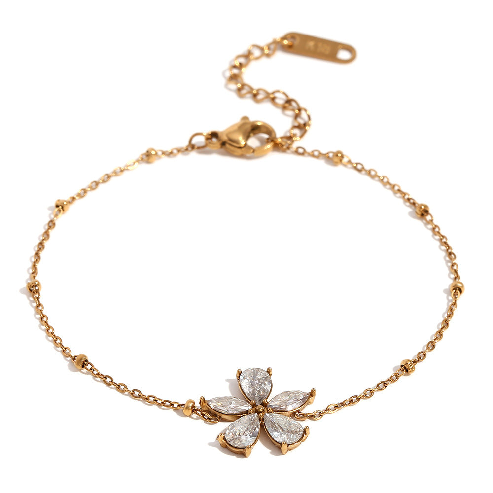Bracciale da donna placcato oro 18 carati in acciaio inossidabile con fiore di zircone, motivo floreale alla moda